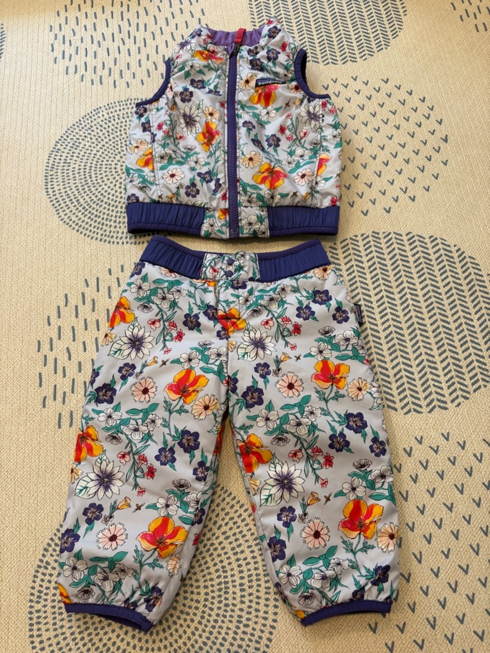 Patagonia purple floral reversible puff ball vest and pant snow set